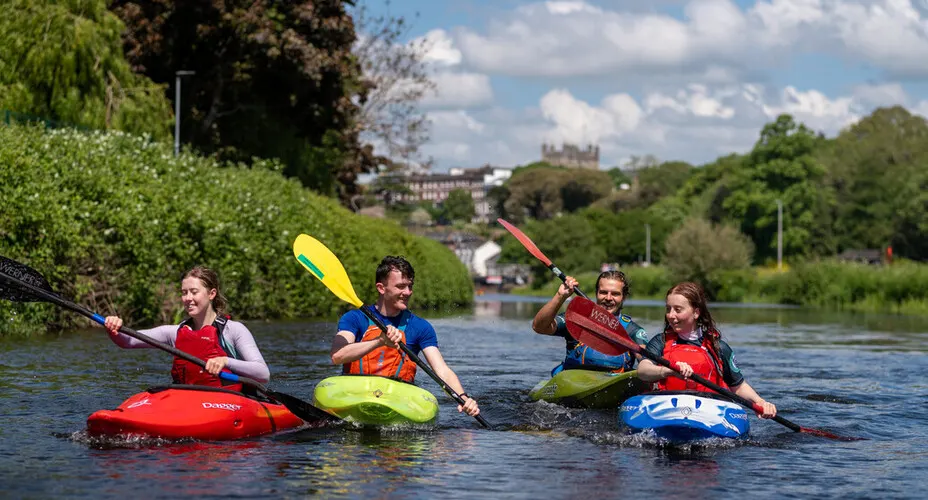 University of Exeter undergraduate students kayaking in the nearby Exeter Canal and Quayside.