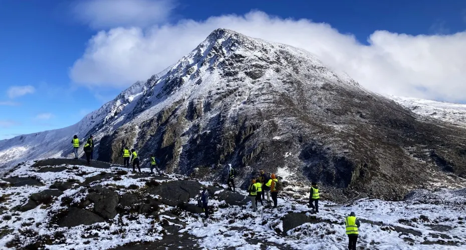 Snowdonia mountain with snow cap and blue sky
