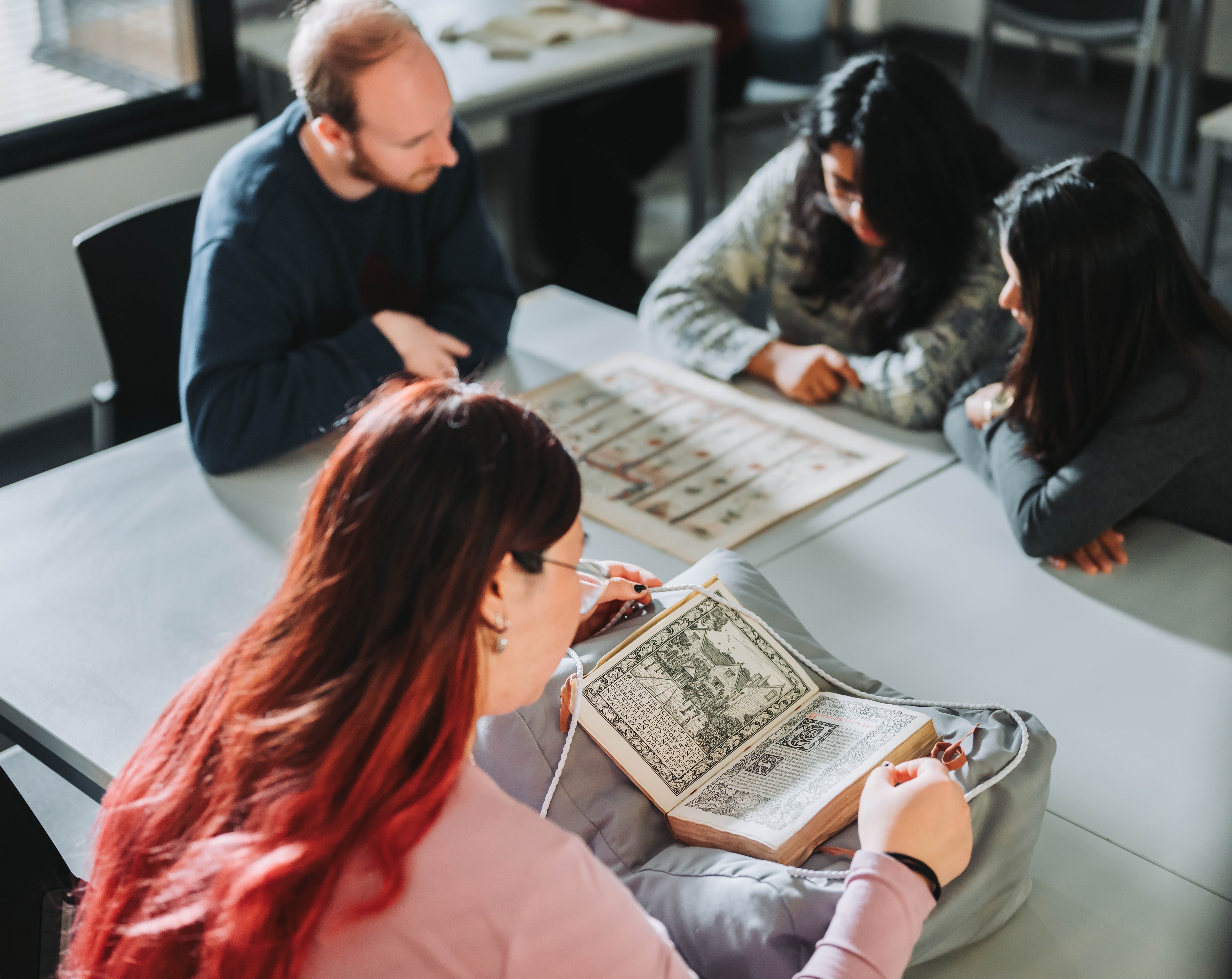 Students looking at material in the Ronald Duncan Reading Room